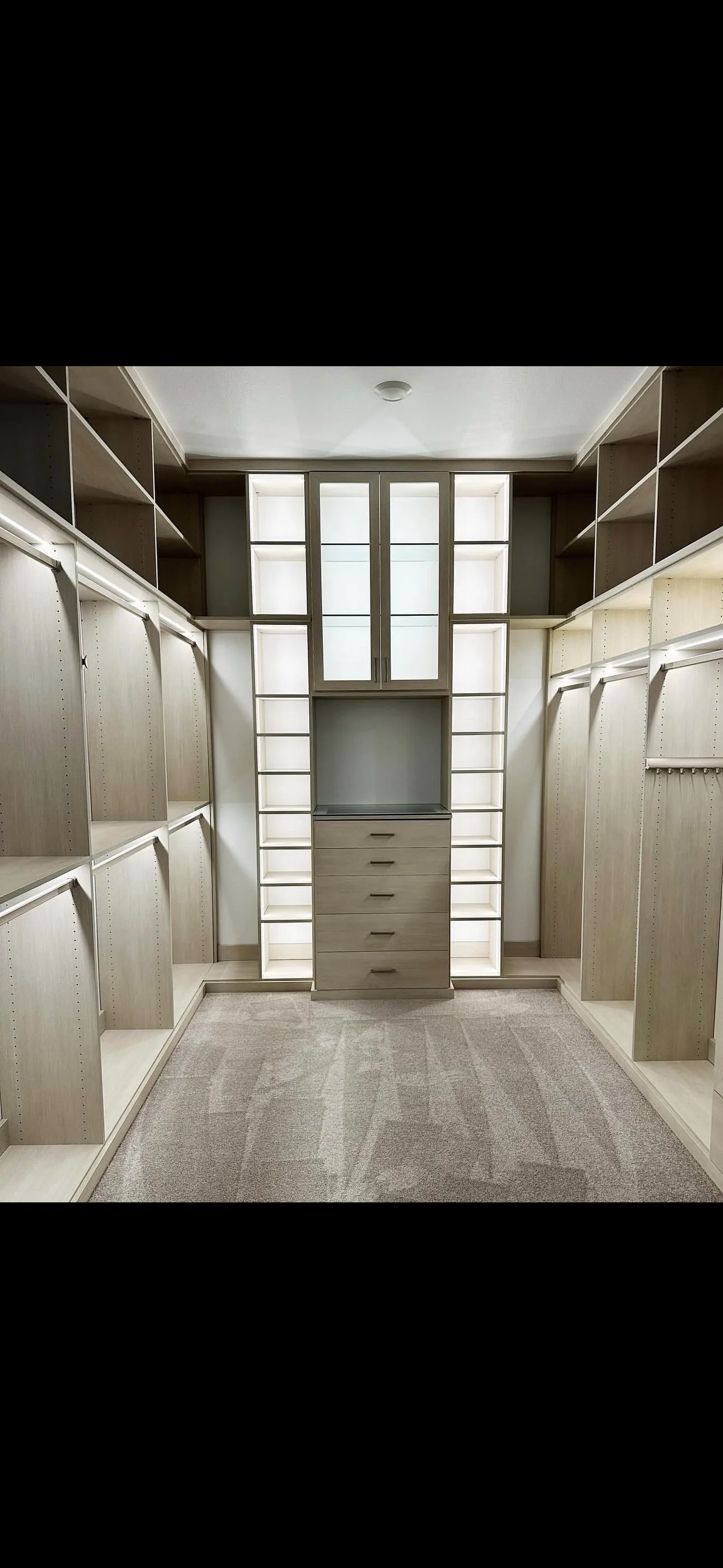 Custom walk-in closet with floor-to-ceiling wardrobe storage